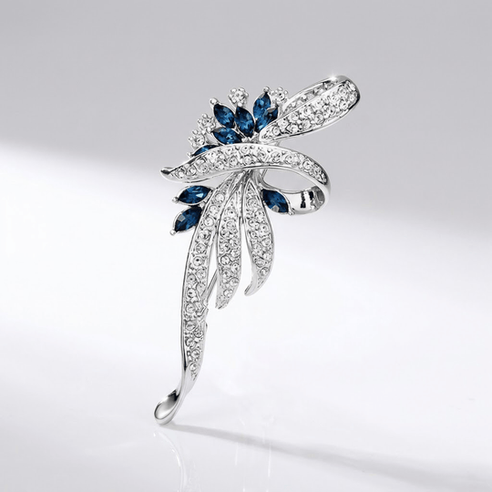 Elegant Sapphire Swirl Brooch